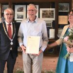 Rozenpenning voor tuinchef Cees van Dam